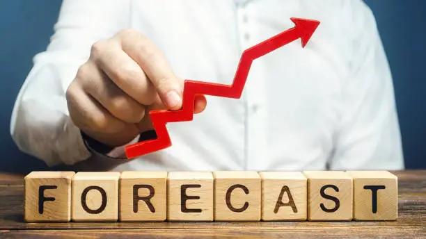 Photo of Man holds red arrow up over word Forecast. Budget surplus, optimistic price quotes, rise of company value. Prediction further development of situation. High demand, profitability, economic prosperity