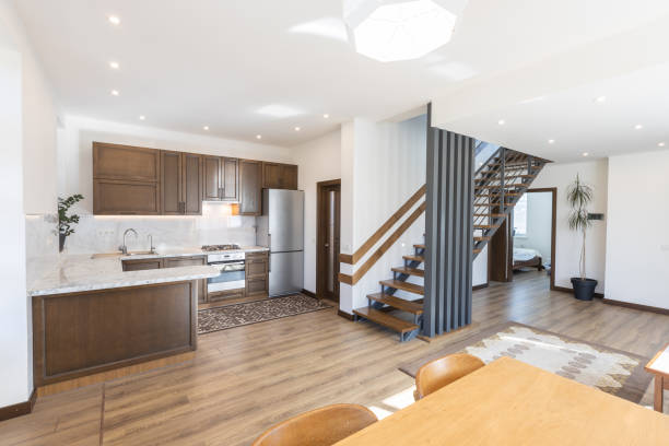 istock Modern wooden kitchen in scandinavian interior with cooking appliances. Real image 1346888275