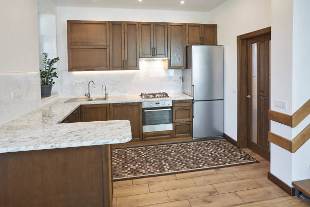 istock Modern wooden kitchen in scandinavian interior with cooking appliances. Real image 1346888290