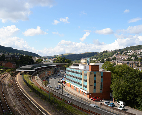 Pontypridd, Wales - May 2018: Aerial view of office buildings and the town's railway station