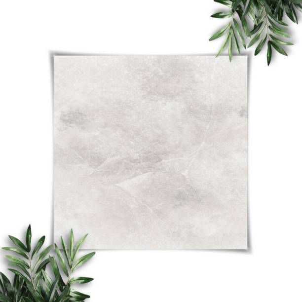 istock Creative look of paper message with leaves. Minimal paper layout for the message. Creative concept of copy space. 1346889465