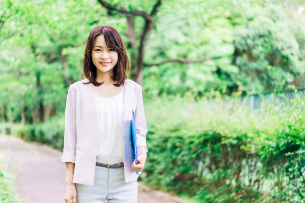 istock A young businesswoman walking with her papers 1346892607
