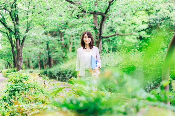 istock A young businesswoman walking with her papers 1346892616