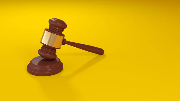 istock Judgement gavel on Yellow background 1346893188