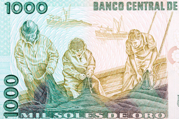 istock Fishermen repairing nets from old Peruvian money 1346900826