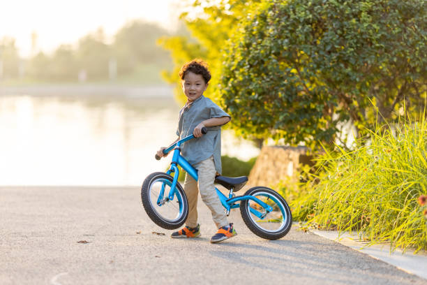 istock A little boy riding a bicycle 1346902286