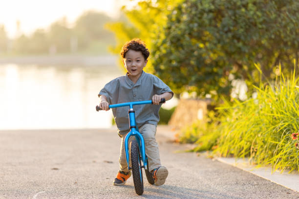istock A little boy riding a bicycle 1346902301
