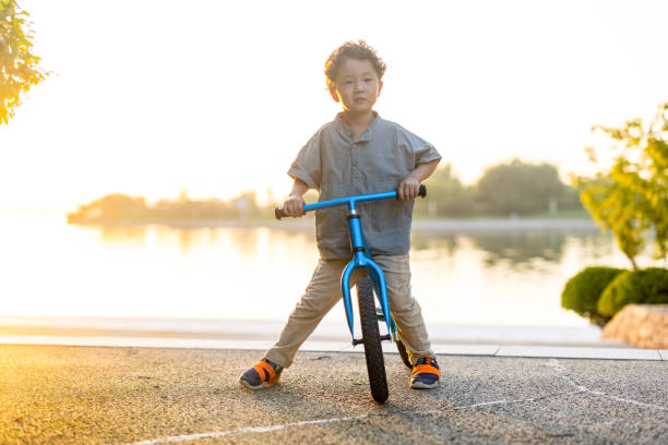 istock A little boy riding a bicycle 1346902307