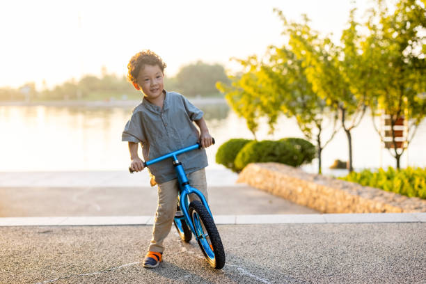 istock A little boy riding a bicycle 1346903033