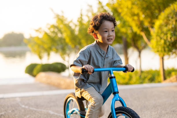 istock A little boy riding a bicycle 1346903042