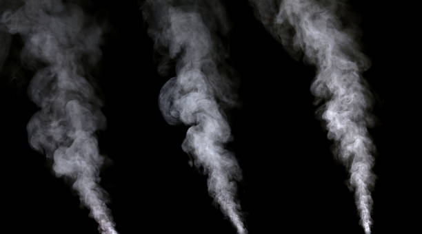 istock group of white smoke or steam spray 1346904582