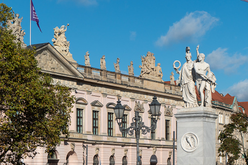 Statue, lantern and building facade on the so-called Museum Island (Museuminsel) in Berlin, Germany. Photo was made at the Sclossbrücke. The building in the picture is the Deutsches Historisches Museum