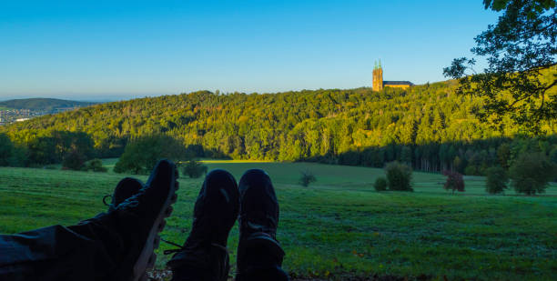 Hiking Shoes in Front of Basilica Fourteen Saints Germany Hiking in Bavaria bad staffelstein stock pictures, royalty-free photos & images