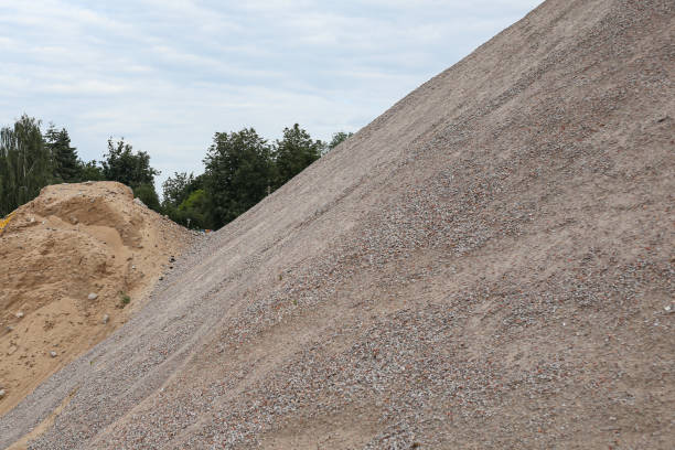 istock Construction site details with grit gravel, stacked in a large stack. 1346910330
