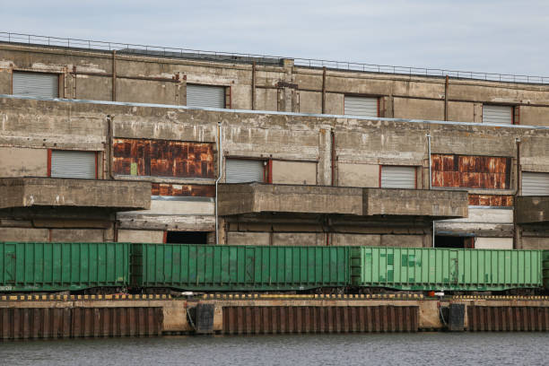 istock Cargo train standing near old brick building in docks. 1346910356
