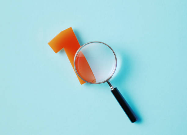 istock Magnifier And Number One On Aquamarine Background 1346915139