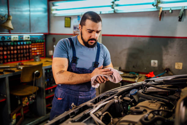 istock Professional mechanic repairing a car 1346915942