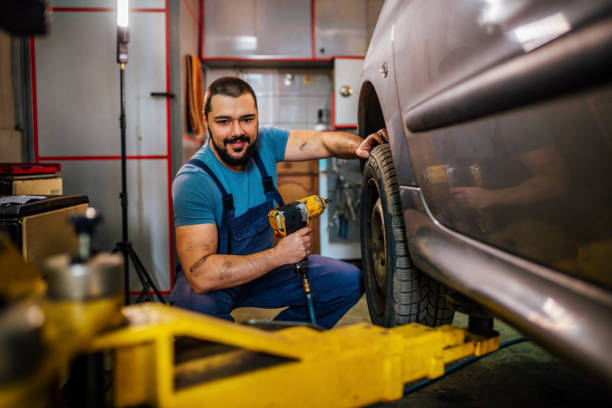 istock Tire changing at car service 1346916276