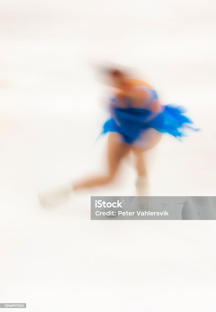 Figure Skating Art Unrecognisable and unidentifiable skater. Long exposure of figureskater creating an artful image of the beauty of figure skating. Art image Figure Skating Stock Photo