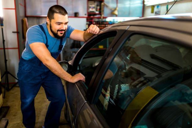 istock Car mechanic talking with customer 1346918505