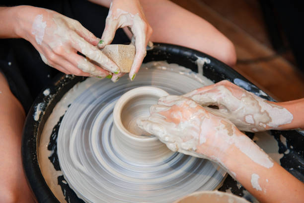 istock Woman hands doing pottery in pair 1346918522