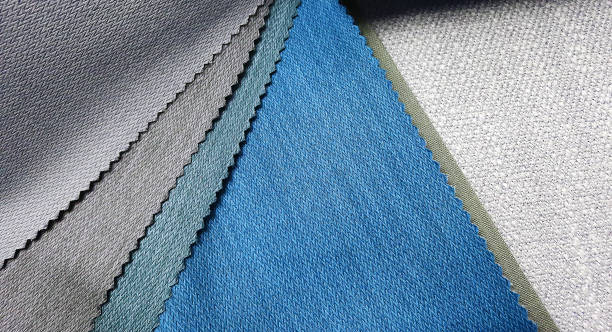 istock colorful bright fabric pattern palette texture samples in grey and blue tone for interior material selection. matching color and texture of drapery materials. close up upholstery catalog for choosing. 1346919212