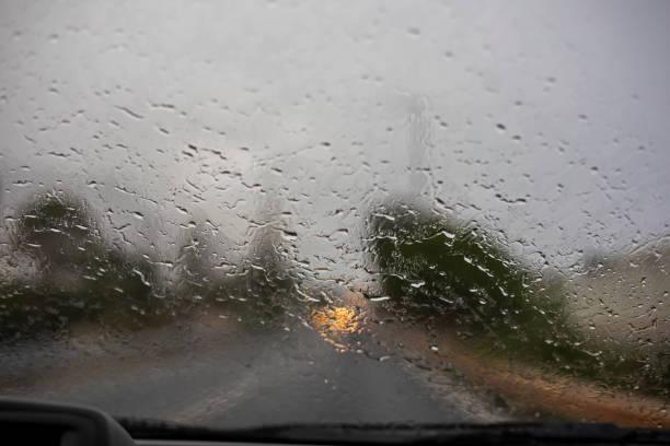 istock abstract blurred background of water jet on car windshield, horizontal 1346923515
