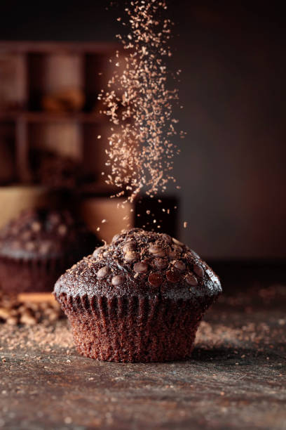 istock Chocolate muffins on a brown background. 1346927182
