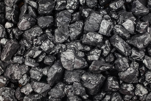 istock Heap of coal as background, top view 1346927627