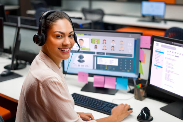 istock Happy woman working as customer service operator at a call center 1346929932