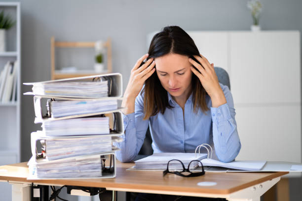 istock Frustrated Bored Accountant Female Employee 1346931555