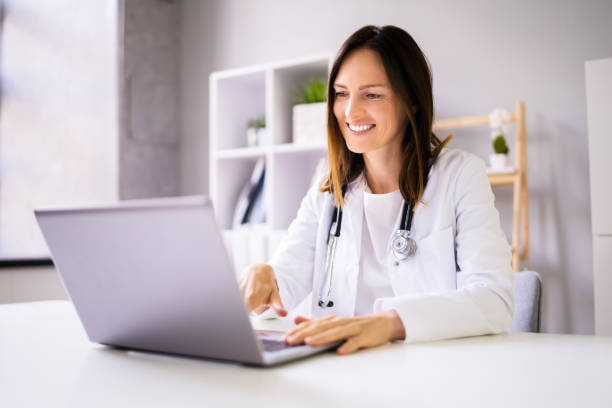 istock Doctor Having Video Conference On Laptop 1346932446