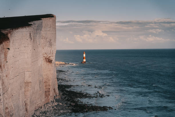 Beachy Head, England - 08-12-2025: Coastal erosion and collapsed path near Belle Tout lighthouse at Beachy Head, UK