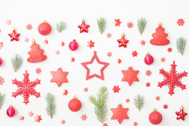 istock Flat lay pattern with fir branches, christmas balls and decorations on a white background 1346938952