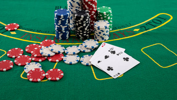 istock various cards with colored chips scattered for a new game of poker 1346940634
