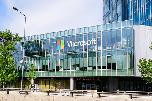 Bucharest, Romania - 15 May 2021: Microsoft headquarter and offices in City Gate Towers in the Northern part of the city in a sunny spring day