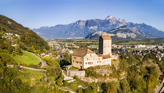 Sargans, Switzerland - September 16. 2021: Aeiral panorama image of the medieval castle in Sargans (built in 1282), Canton of St. Gallen, Switzerland.