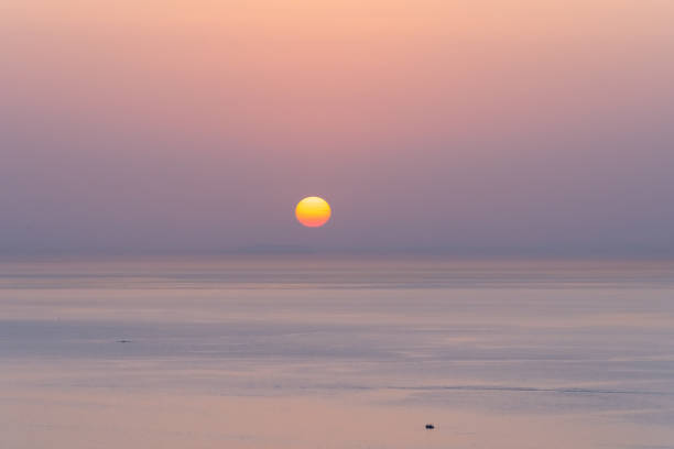 istock beautiful minimalist sunset over the sea 1346956576