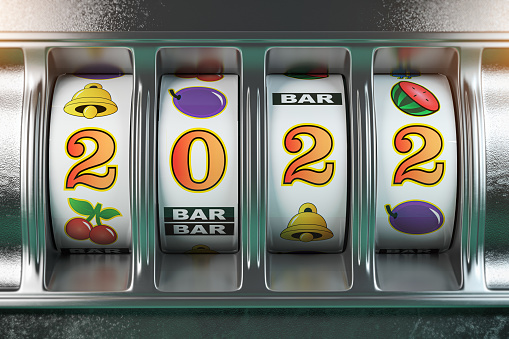 2022 Happy New Year  in casino. Slot machine with jackpot number 2022. 3d illustration