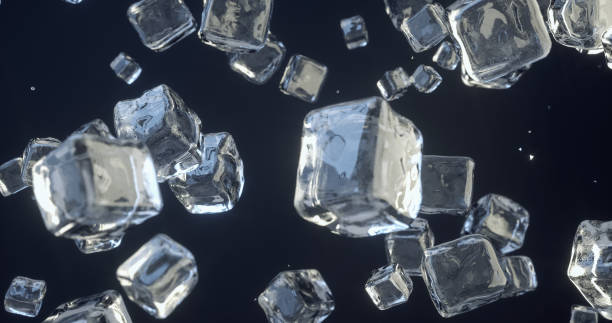 istock Amazing scene of ice cubes falling. 1346965475