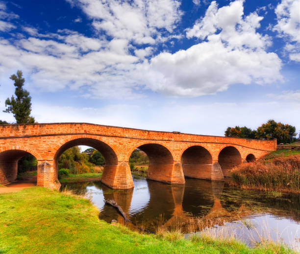 Old historic stone made masonry bridge in RIchmond town of Australia across the river.