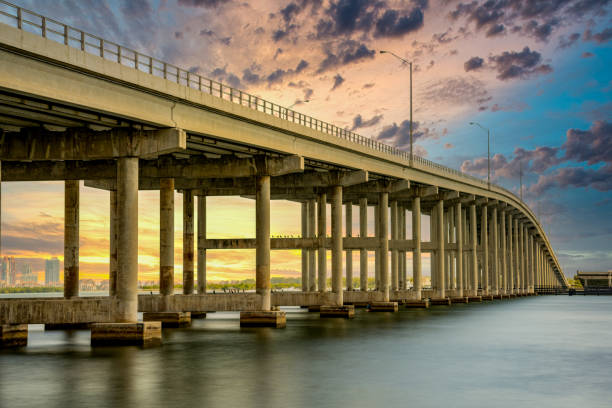 istock Causeway bridge with beautiful dramatic sunrise sunset 1346976076