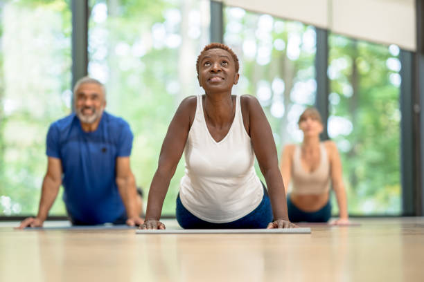 istock Yoga students do upward dog 1346977667