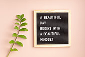 Felt letter board with text beautiful day begins with beautiful mindset. Mental health idea
