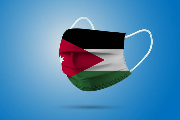 istock Realistic Protective Medical Mask with National Flag of Jordan. 1346983615