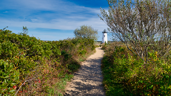 A path leading to Edgartowm Harbor Lighthouse on Marthas Vineyard, Massachusetts.