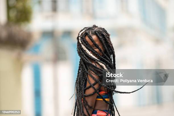 Afro Woman Hiding Face With Braids Stock Photo - Download Image Now - Braided Hair, Afro Hairstyle, Women