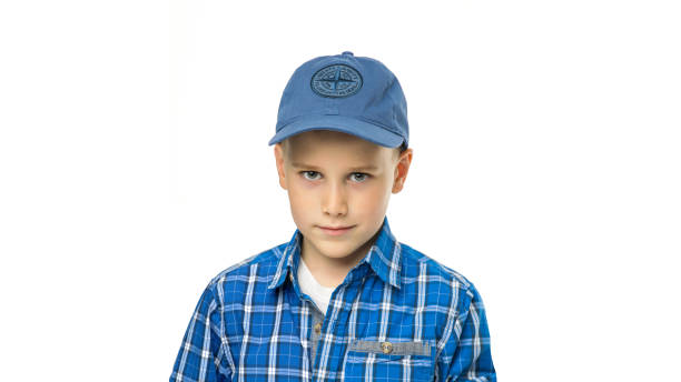istock Shooting in a photo studio a 7-year-old boy portrait on a white background 1346993138
