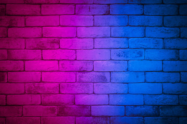 istock Lighting effect red and blue on empty brick wall background. Backdrop decoration party happy new year happiness concept, Showing or placing products. Lighting effect pink and cyan wall background. 1347005859