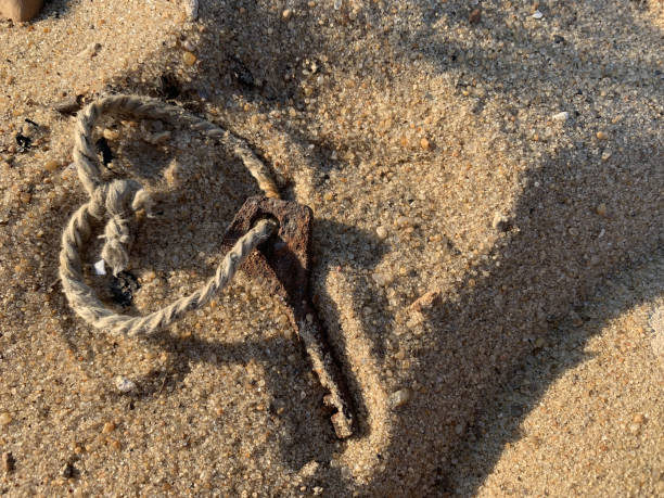 istock Lost key in the sand 1347015029